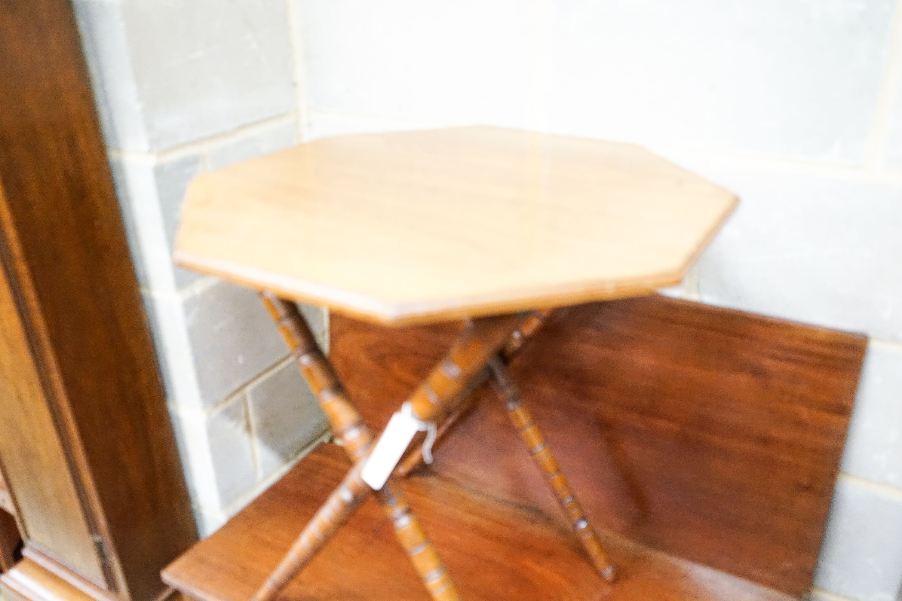 A George III folding tea table and a later walnut octagonal folding table